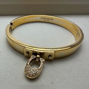 Coach Gold Hinged Bracelet with Crystal Accent Charm